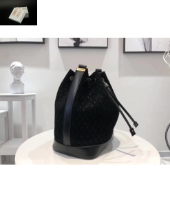 Replica YSL Fake Saint Laurent Monogram All Over Bucket Bag In Black Suede 2